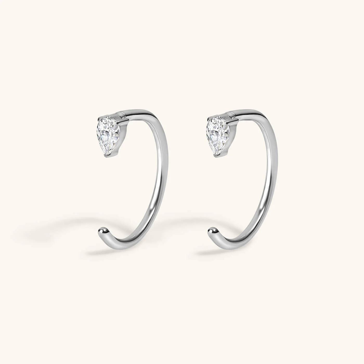 Crystal Pear Open Huggie Hoops in Titanium - Image 4